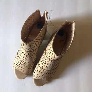 Light pink peep-toe booties